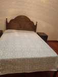 Cama de madeira vintage