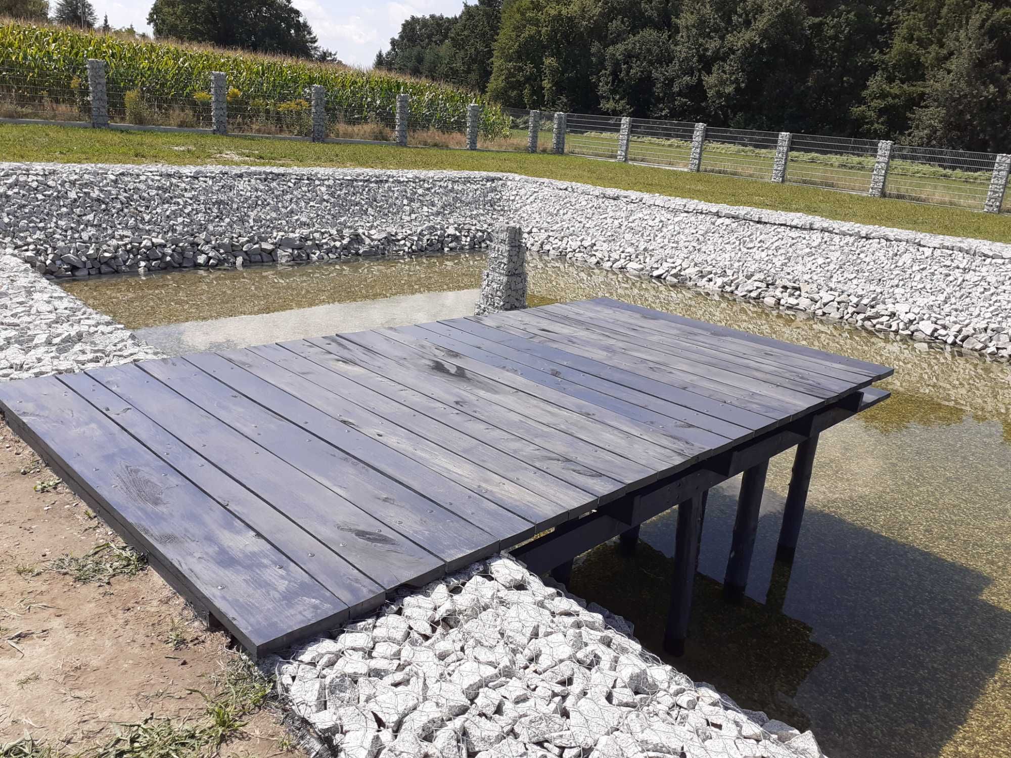 Budowa pomostów i kładek. Roboty w zakresie inż. wodnej i ochrony śr.