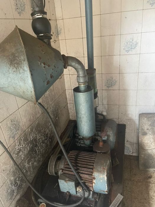 Bomba de vacuo de ordenha