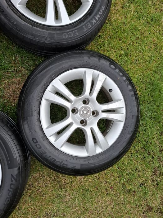 koła alufelgi 15 185/65/R15 OPEL CORSA D E 4x100 9