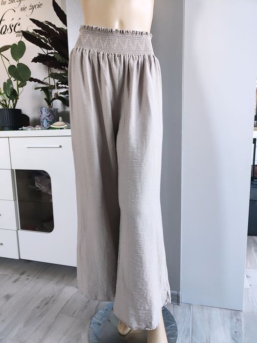 Nowe beżowe spodnie kuloty z szerokimi nogawkami wysoki stan 36 38