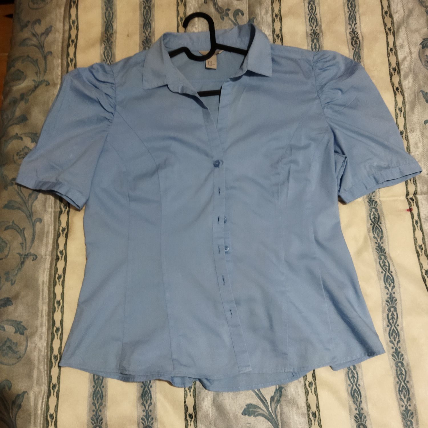 Camisa azul marca H&M