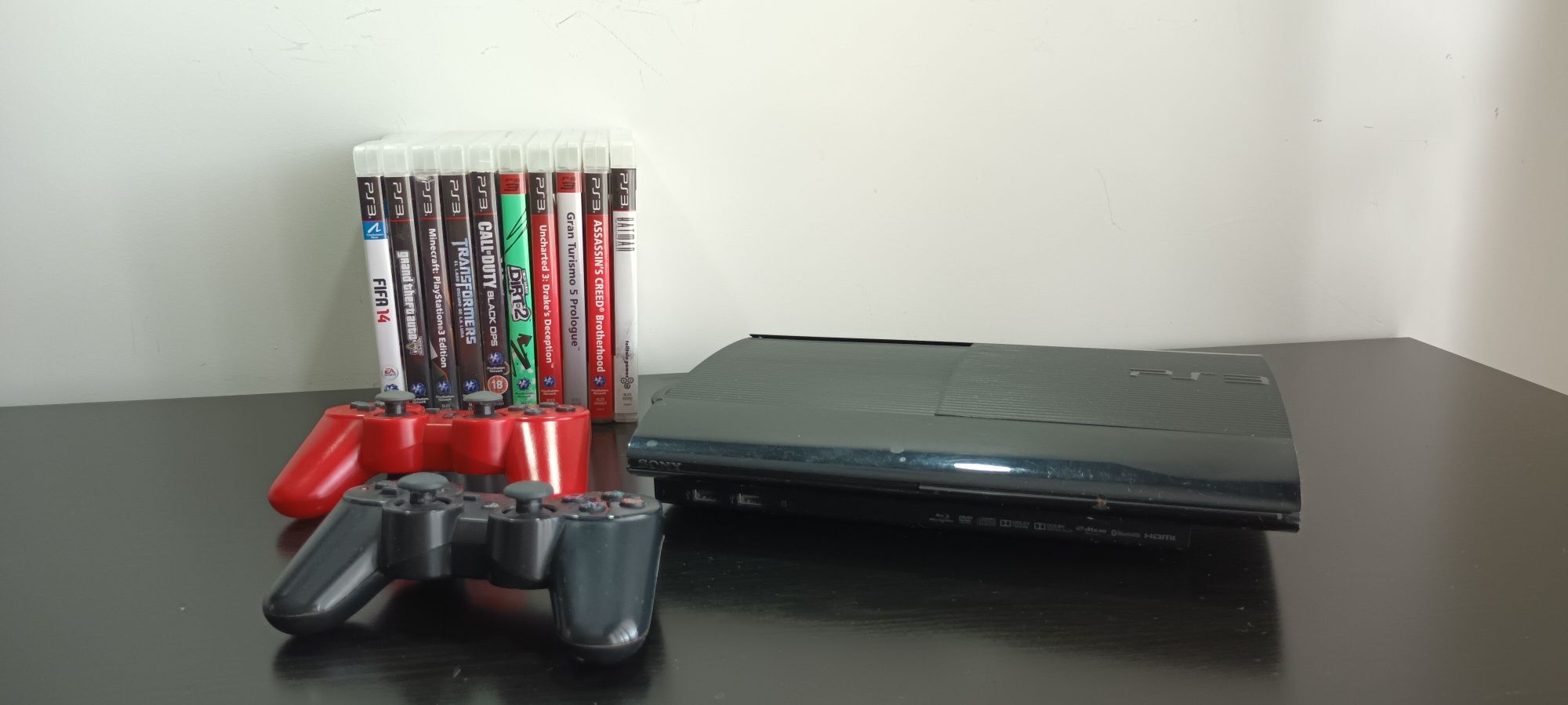 Ps3 com 10 jogos e 2 comandos