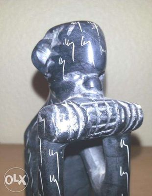 Estatueta O Pensador em pedra