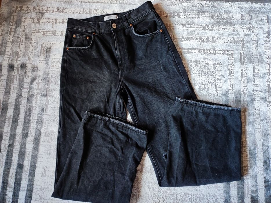 Spodnie z wysokim stanem szerokiemu nogawki