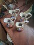 Quatro jarrinhos em ceramica
