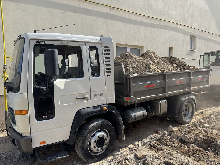 Вивіз сміття з вантажниками