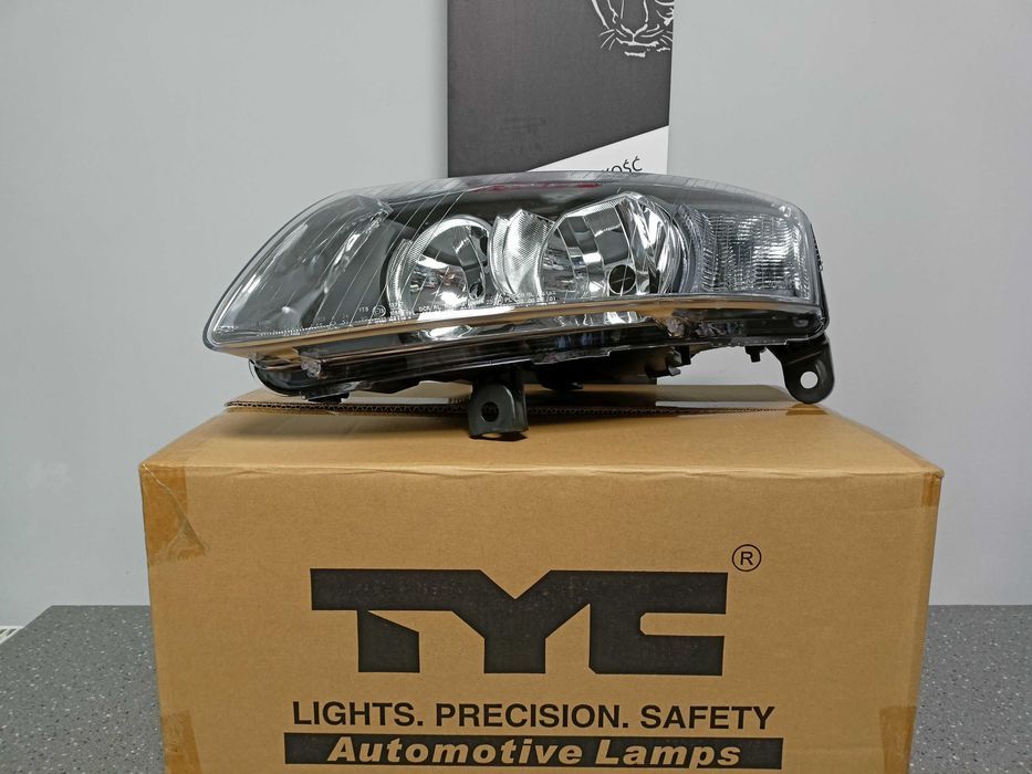 Audi A6 C6  04-10.2008 Lampa/Reflektor przód lewy /H1+H7
