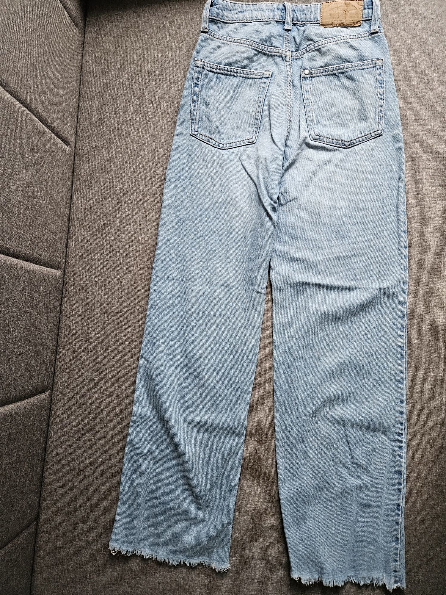 Dżinsy H&M rozm. 34 model wide z przetarciami