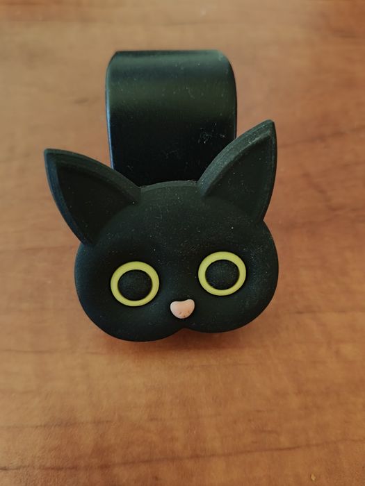 Uchwyt do samochodu na zagłówek kot