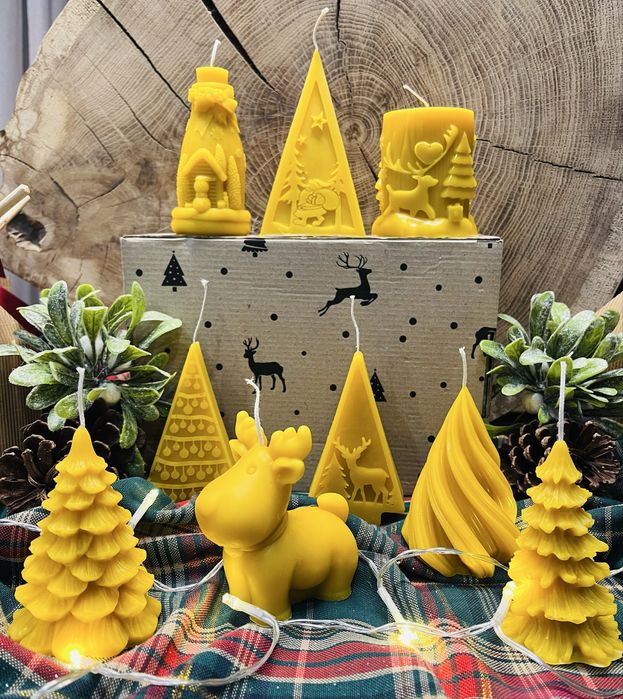 Świece z wosku, miody i syropy malinowe