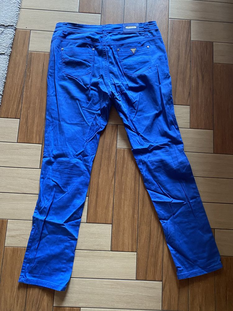 Spodnie niebieskie materiałowe rozm. 35 denim damskie Miss Cherry