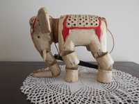 Curiosa marioneta de elefante branco em madeira velha. Origem França.