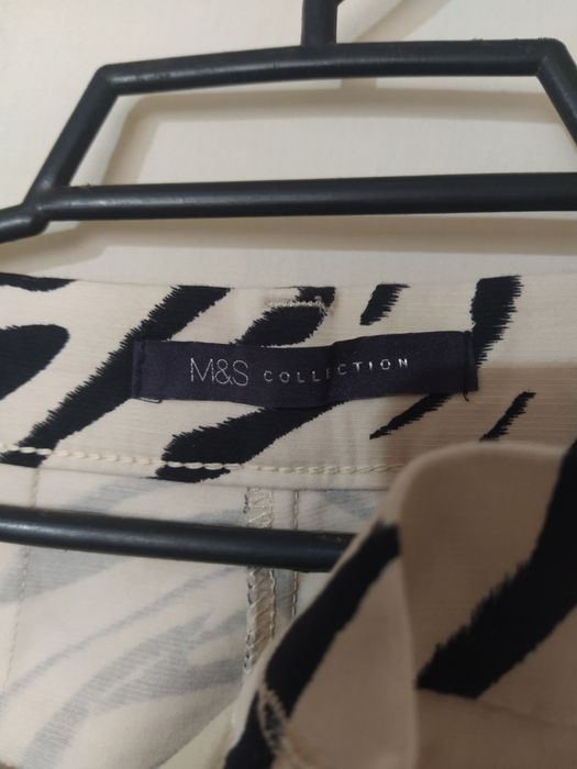 Брюки  в гарно стані . Принт зебра . Фірми  M&S.