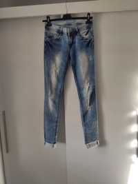 Nowe spodnie jeansowe damskie