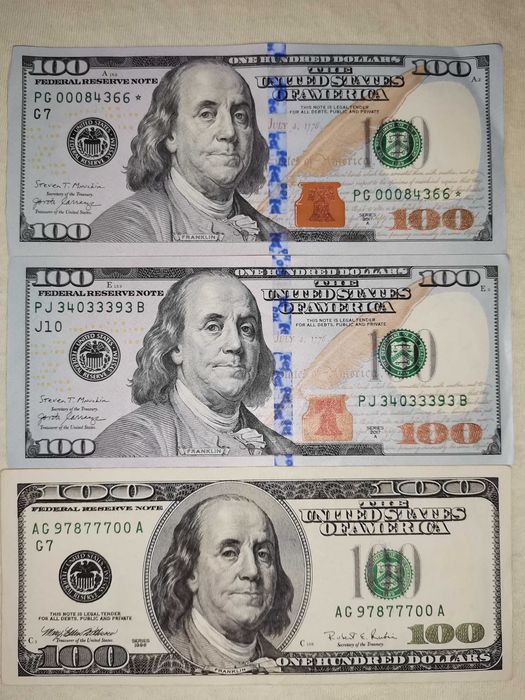 Купюра * 100$ со звездой * и номера с 333 и 777
