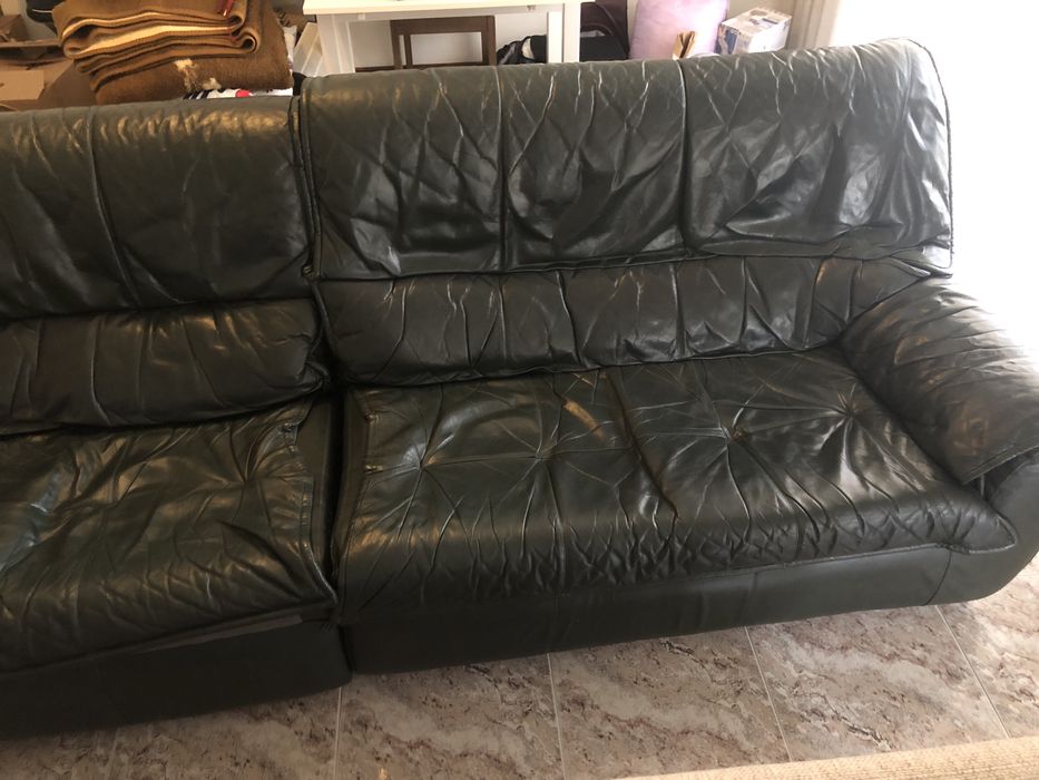 Sofá de canto verde garrafa