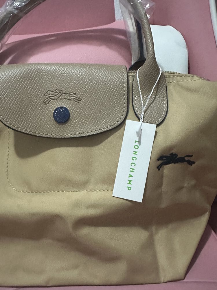 Mala Longchamp creme