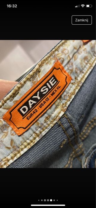 Spodnie jeansowe gumowane z dziurami rozmiar XL