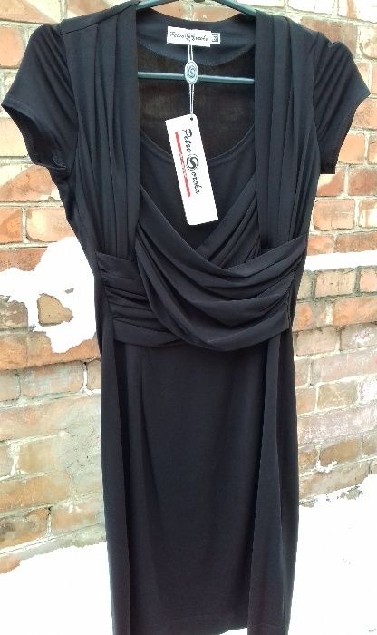 Продам нове чорного кольору плаття(розмір 42-44)