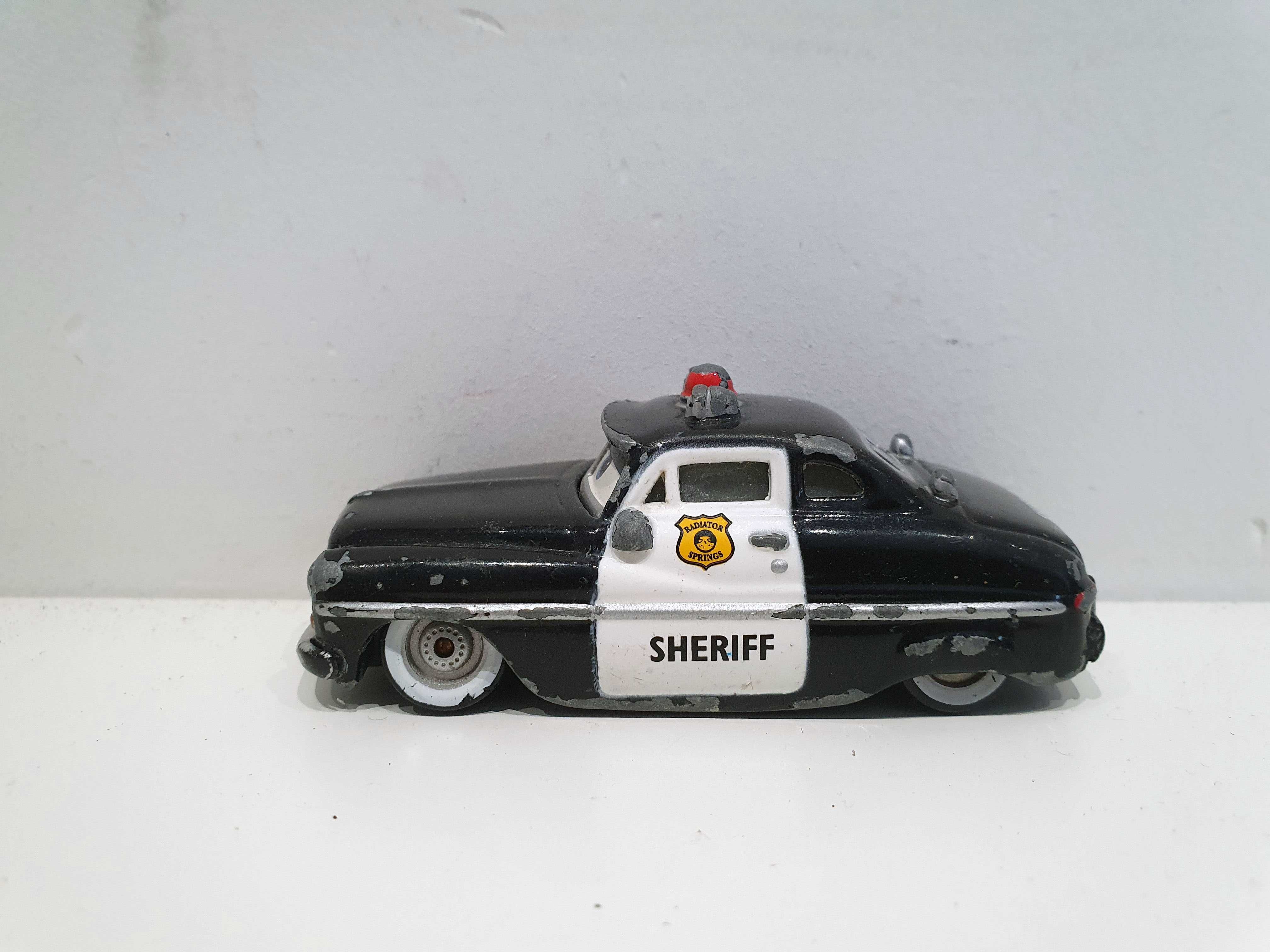Mattel Disney Pixar Cars Auta Szeryf Sheriff DXV29