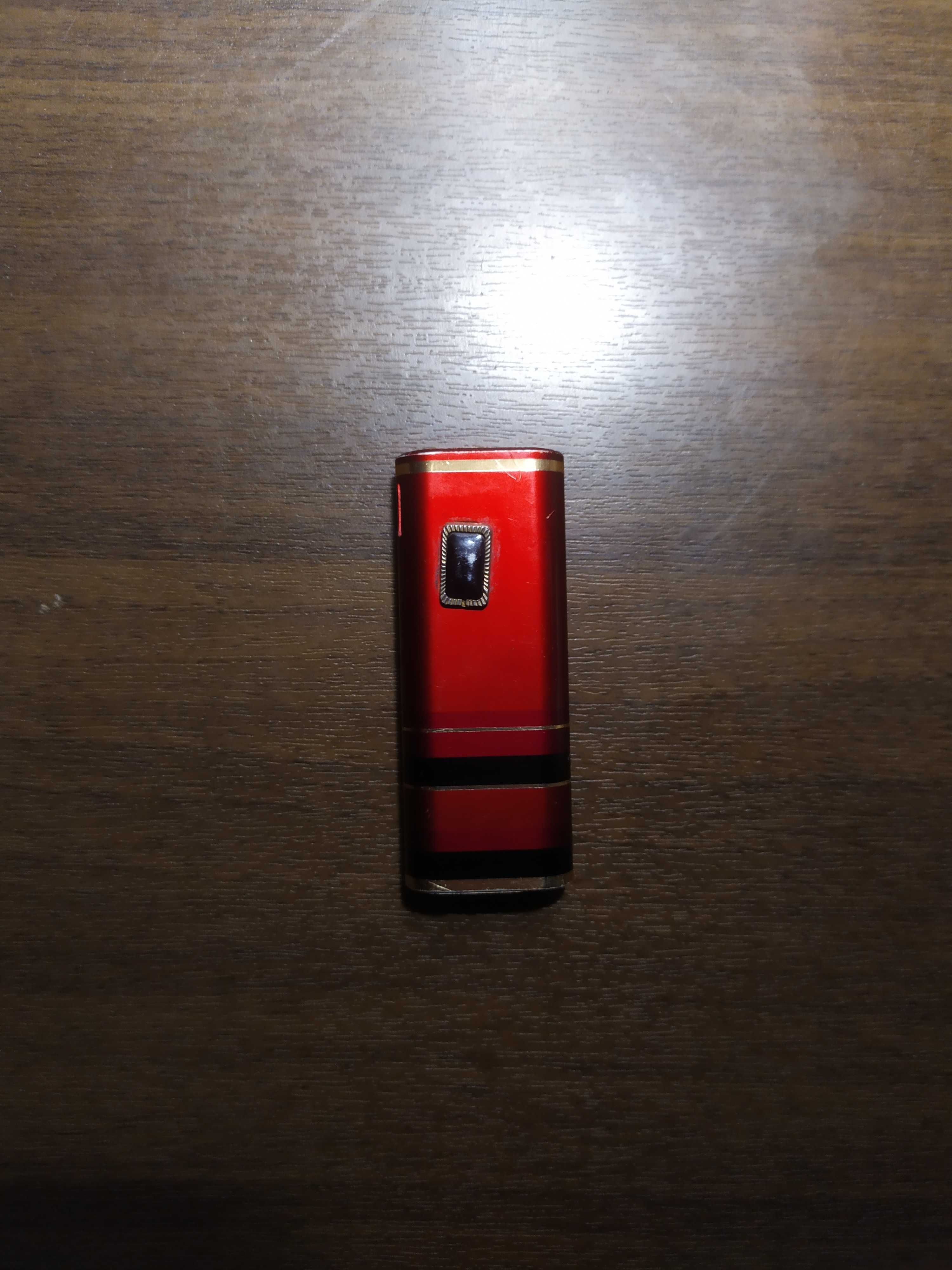 Продам зажигалку Penguin