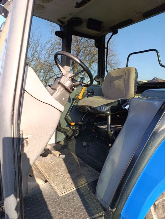 Трактор нью холанд