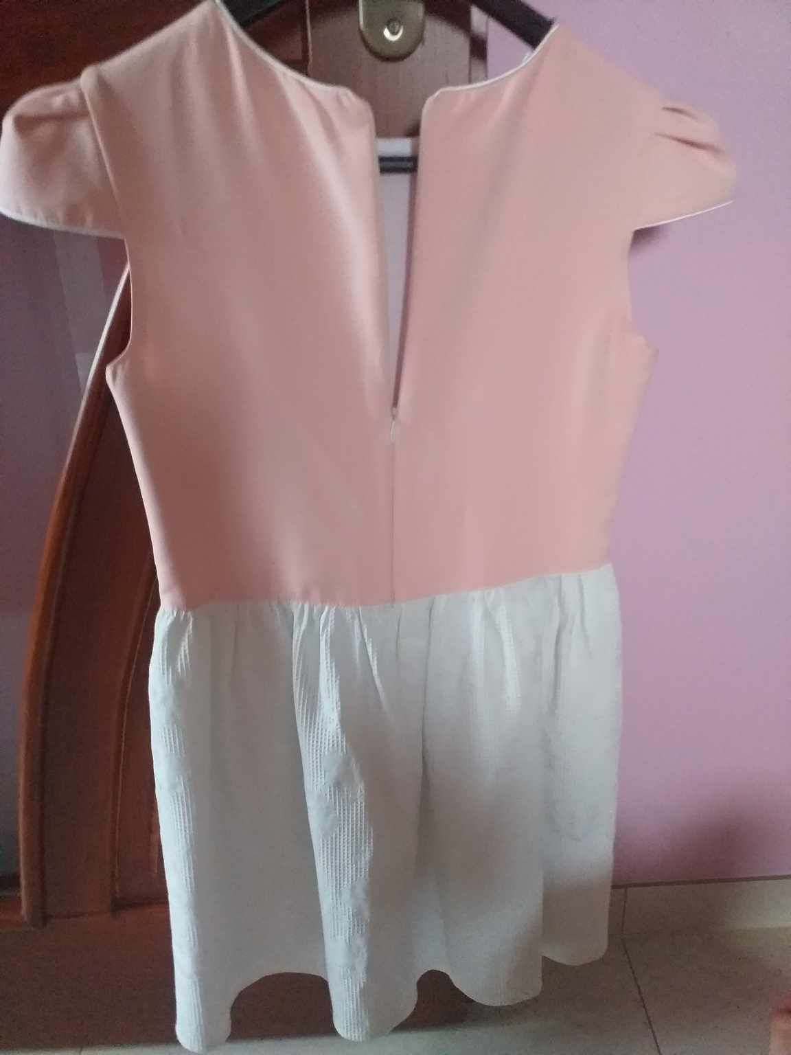 Dziewczęca sukienka z kokardką 140 cm