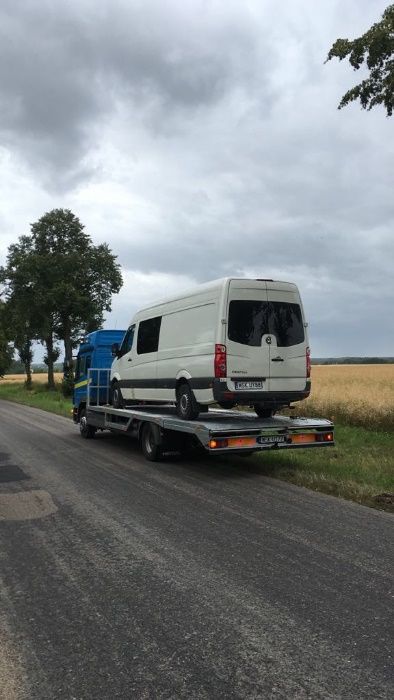 POMOC DROGOWA Holowanie Transport busów ciągników AUTOLAWETA
