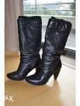 Botas de pele cano alto salto alto