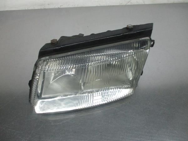 Ótica / farol esquerda VOLKSWAGEN Passat (3B2)