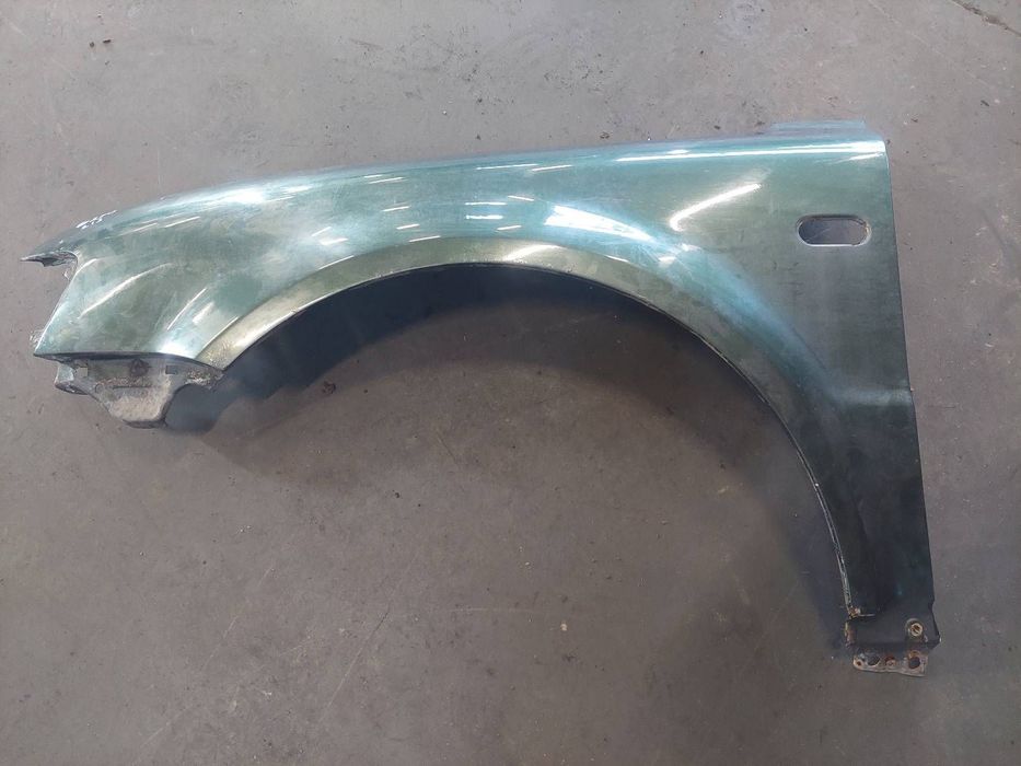 BŁOTNIK LEWY PRZÓD VOLKSWAGEN PASSAT B5 LC6N