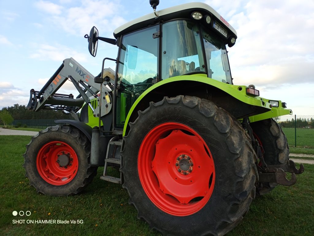 Claas Ares 557 z ładowaczem