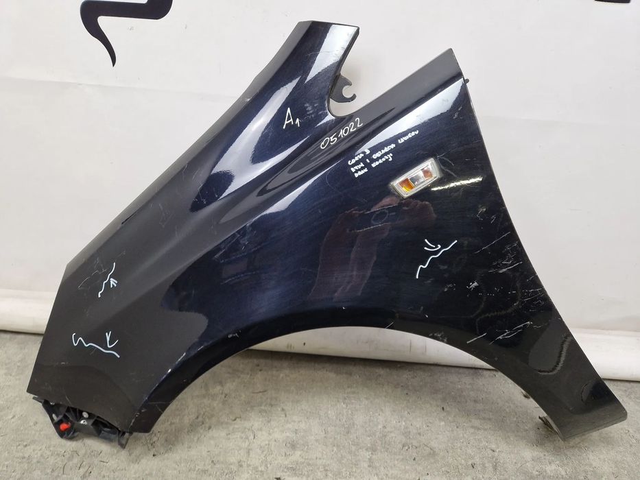 Błotnik przód przedni lewy Opel Corsa D