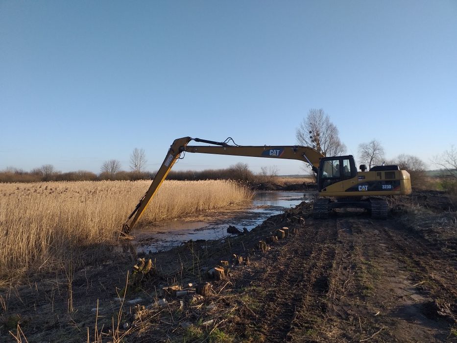 Roboty ziemne kopanie zbiorników retencyjnych stawów staw wykopy plaże
