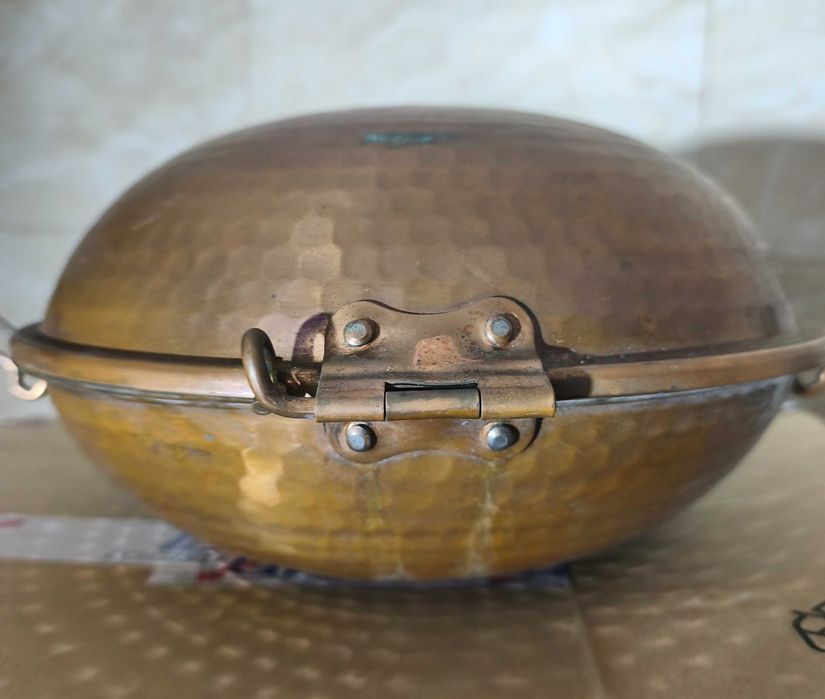 Peça de cozinha em cobre