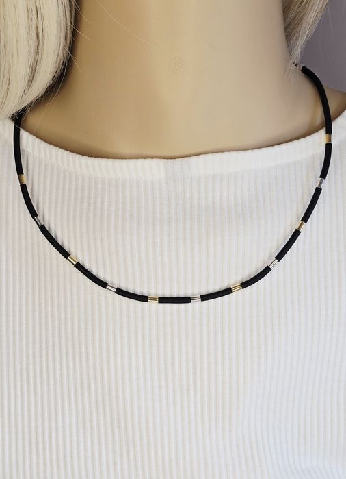 Naszyjnik na kauczuku ze złotymi elementami próba 585 14k 
- Waga: g