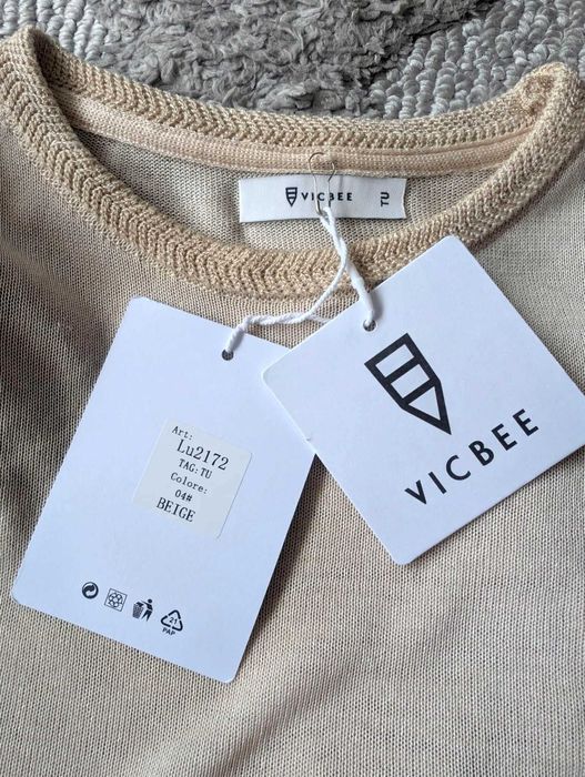 Wiskozowa bluzka sweterek na różne okazje z tiulowymi rękawami