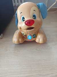 Jezdzik pchacz piesek Fisher price gra świeci