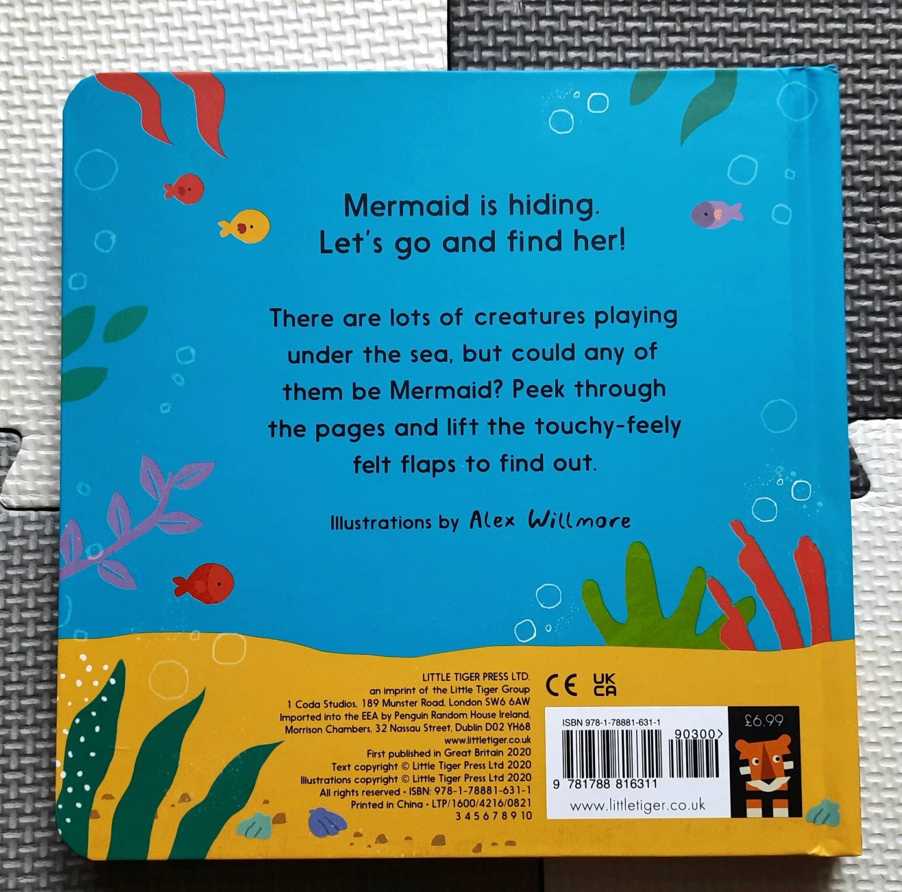 Let's Find The Mermaid książeczka po angielsku z okienkami sensoryczna