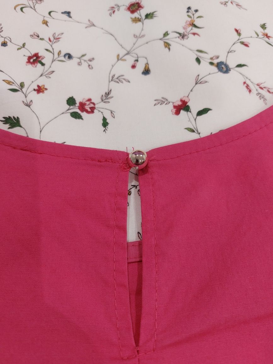 Blusa Rosa sem ombros com laços nas mangas