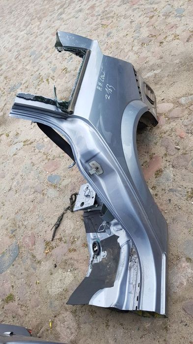 błotnik lewy tył Opel Astra H kombi