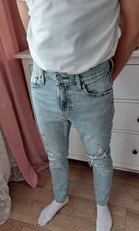 Jasne spodnie jeansowe Levi's 510 męskie W30 L30 z dziurami sk