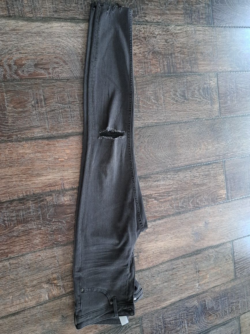 Spodnie jeans z dziurami 38 H&M