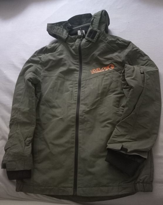 Ciepła kurtka . wg metki dla dziecka 13-14 lat