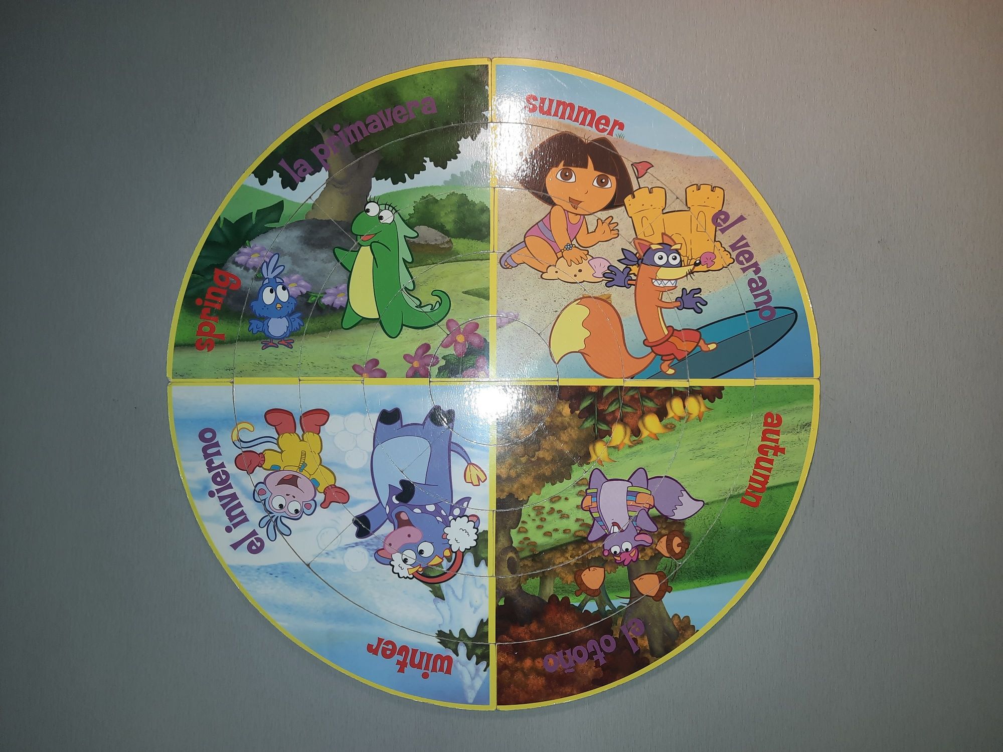 Drewniane dwustronne puzzle Dora poznaje świat