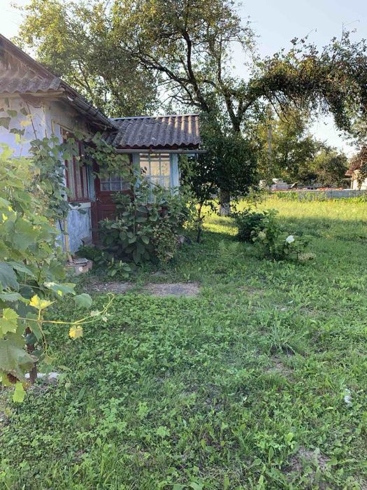Продам ділянку 0.25га із старим деревяним будинком