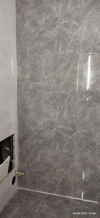 Укладка керамічної плитки,ламінат,шпаклівка стін .