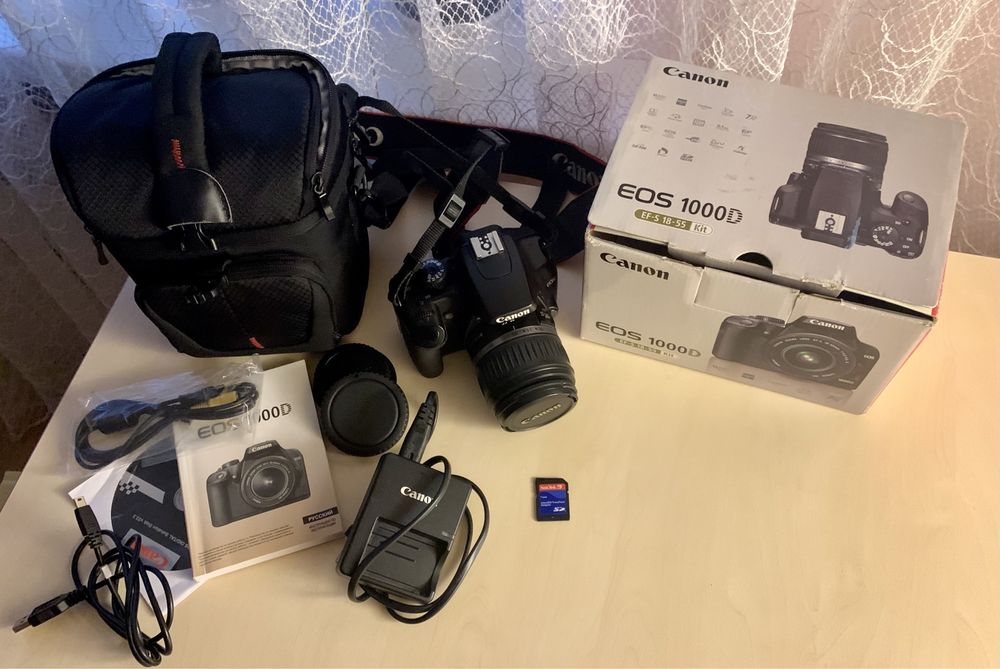 Продам фотоаппарат Canon EOS 1000d