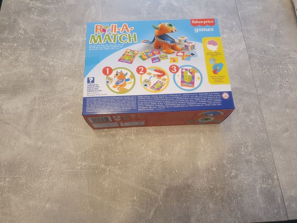 PL Fisher Price Gra towarzyska edukacyjna POTWORKOWE MEMORY Roll-A-Mat